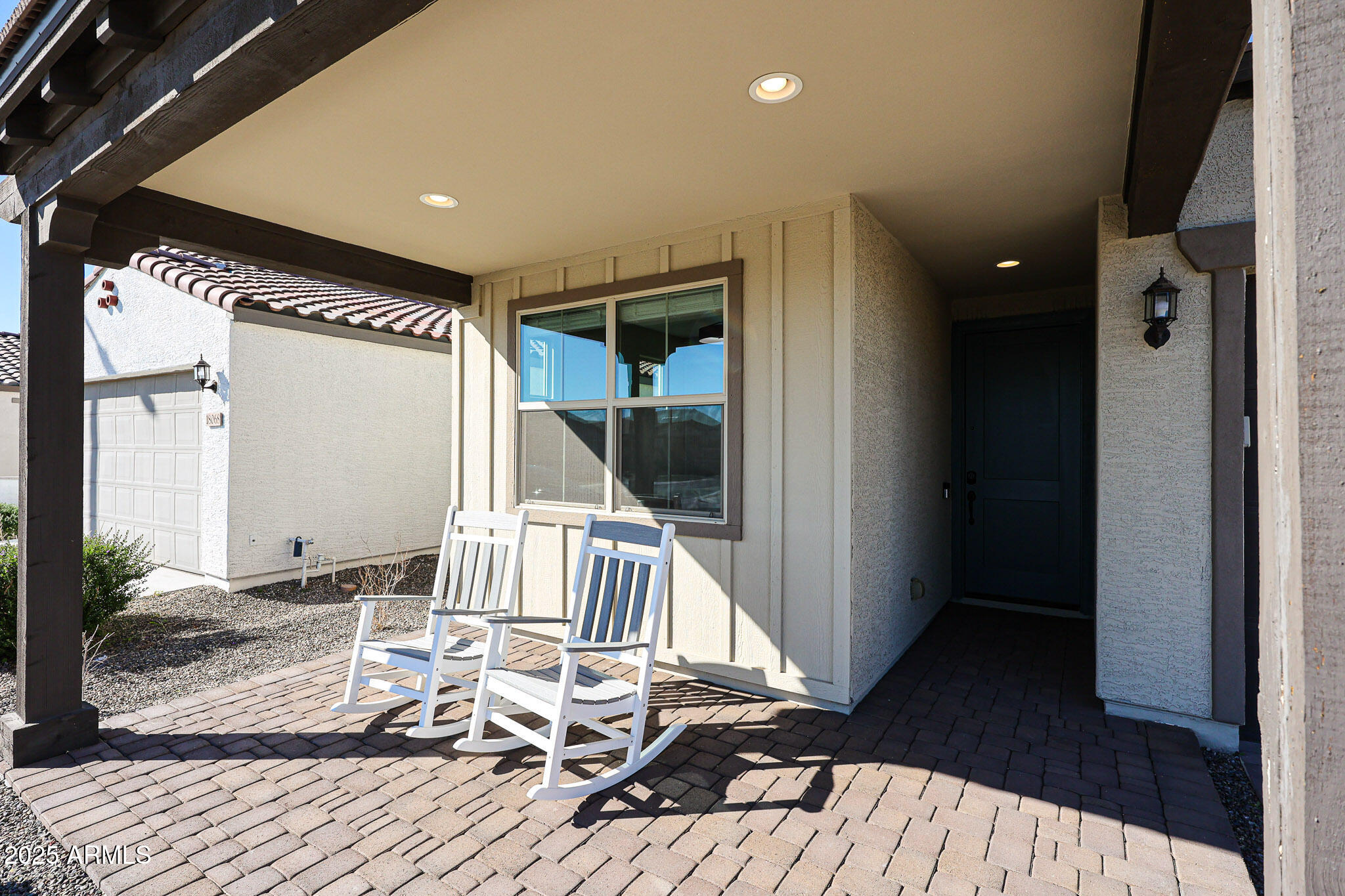 18062 West Amber Ridge Way Goodyear, AZ 85338 - Photo 4 of 67 a view of balcony with wooden floor and outdoor space