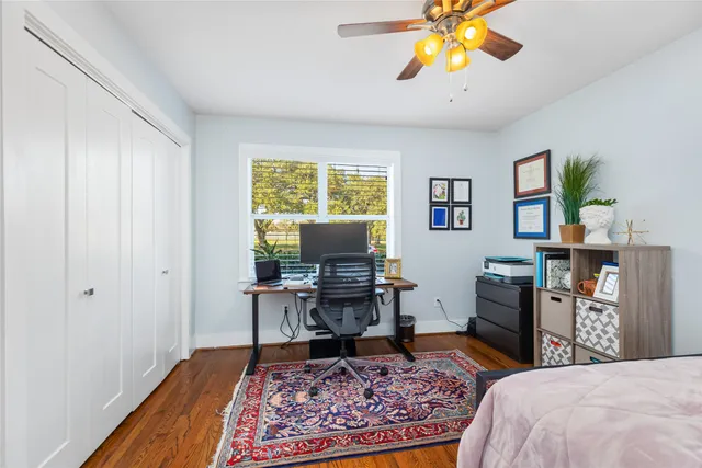 a workspace with furniture and window