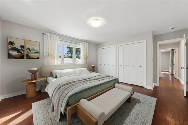 a bathroom with a granite countertop sink a mirror and a bathtub
