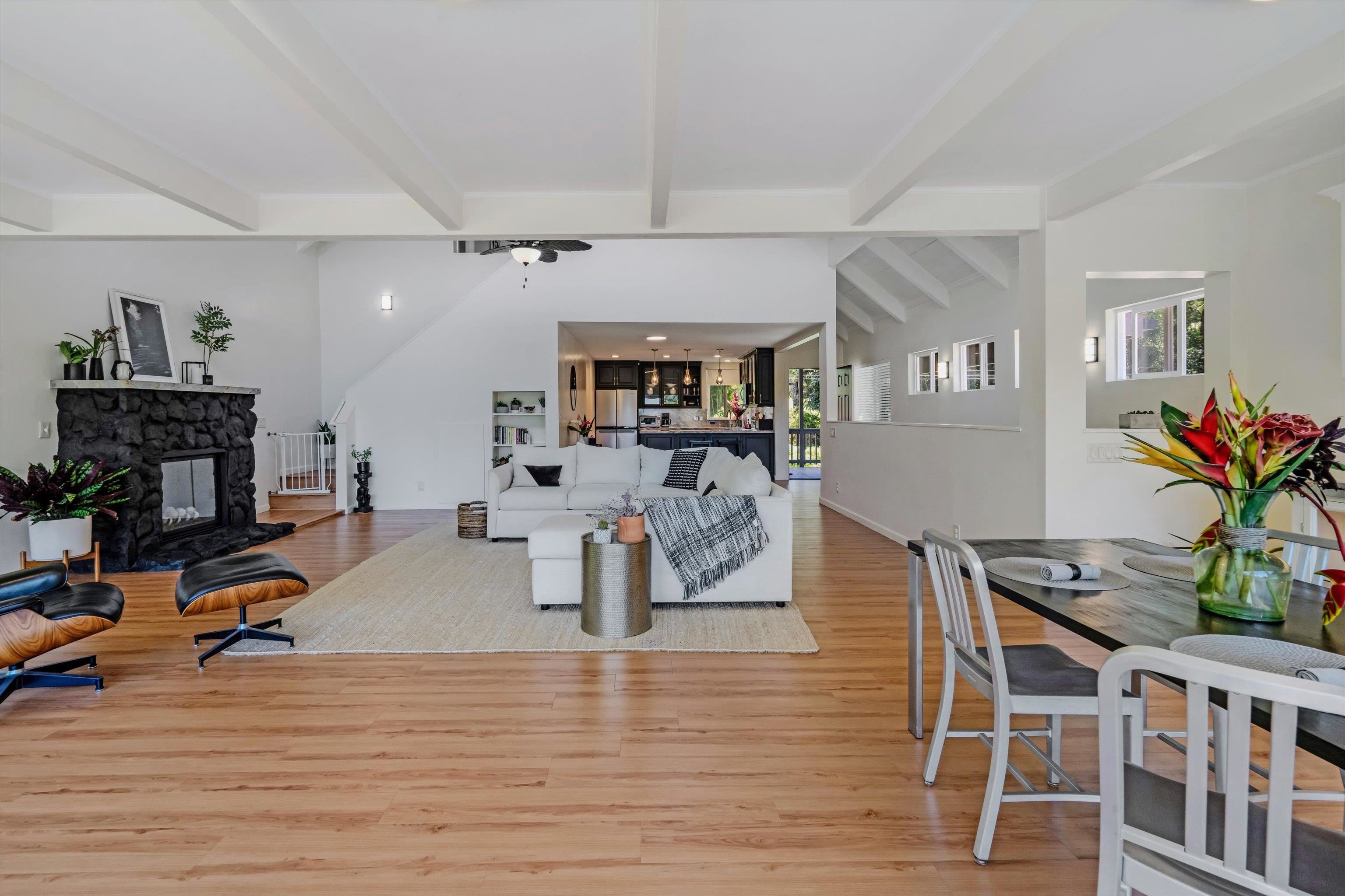 303 Waipalani Road Haiku, HI 96708 - Photo 12 of 46 a living room with furniture and a wooden floor