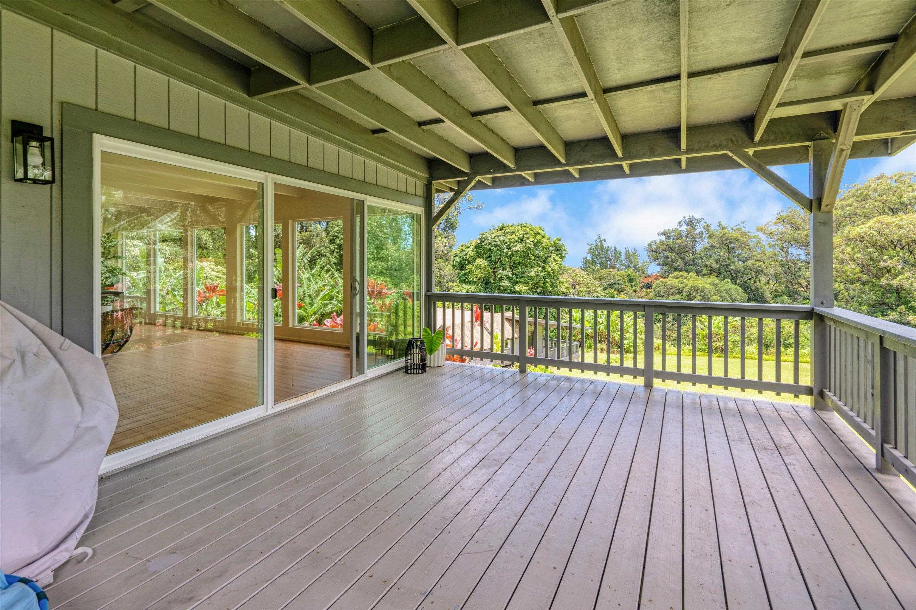 303 Waipalani Road Haiku, HI 96708 - Photo 13 of 46 a view of balcony with wooden floor