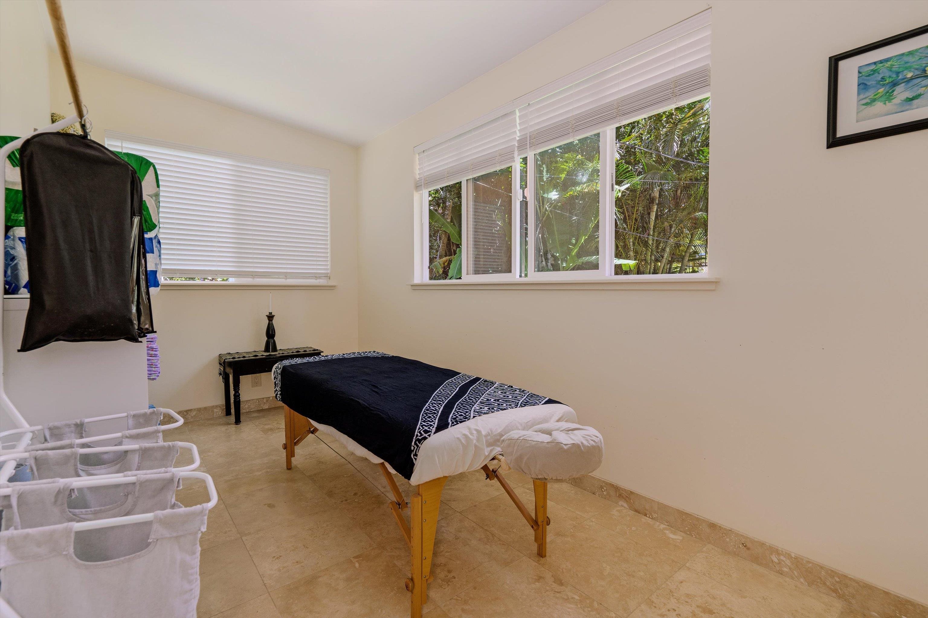 303 Waipalani Road Haiku, HI 96708 - Photo 22 of 46 a living room with furniture and a window