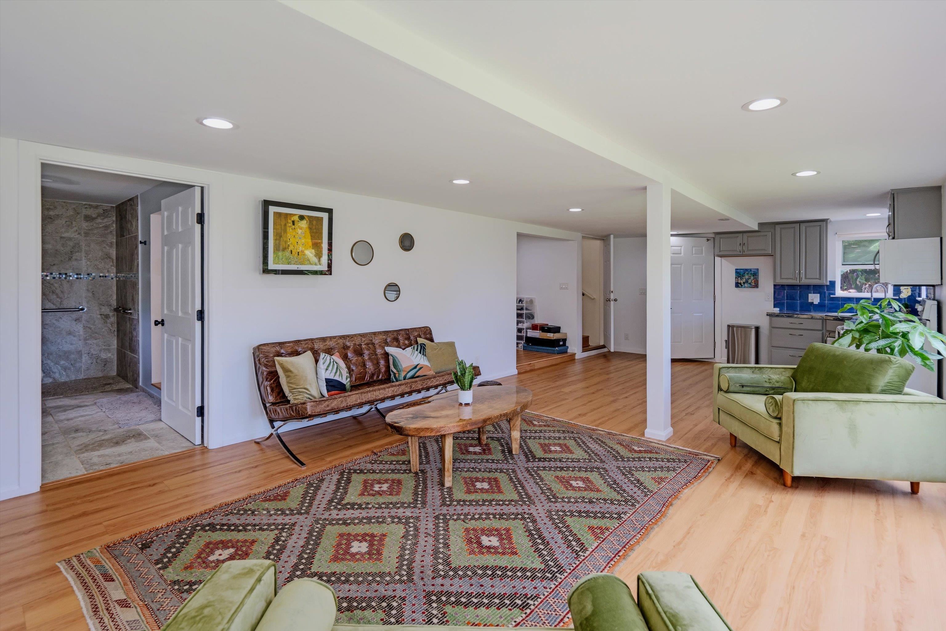 303 Waipalani Road Haiku, HI 96708 - Photo 27 of 46 a living room with furniture and a wooden floor