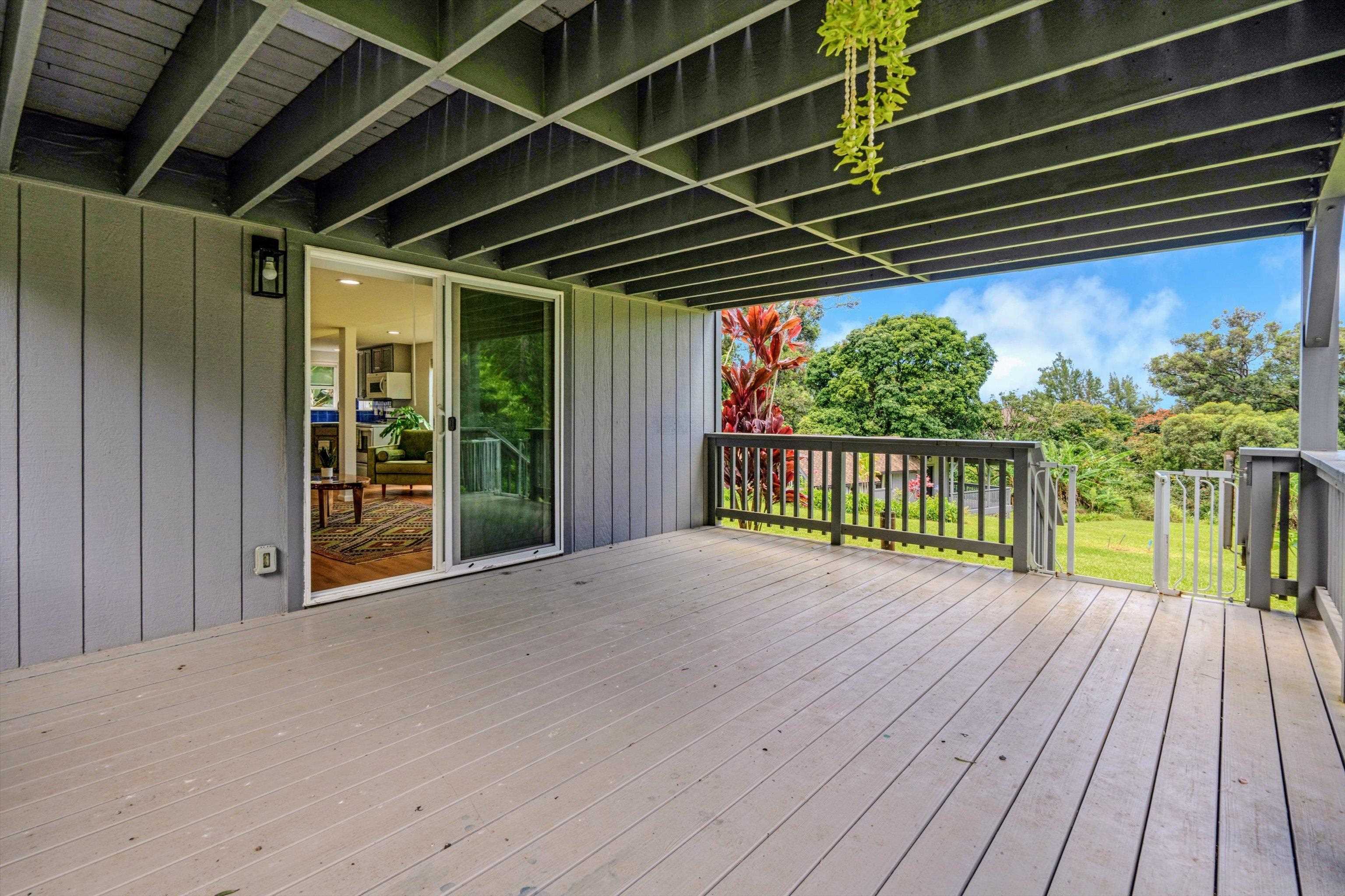 303 Waipalani Road Haiku, HI 96708 - Photo 31 of 46 a view of a porch with wooden floor