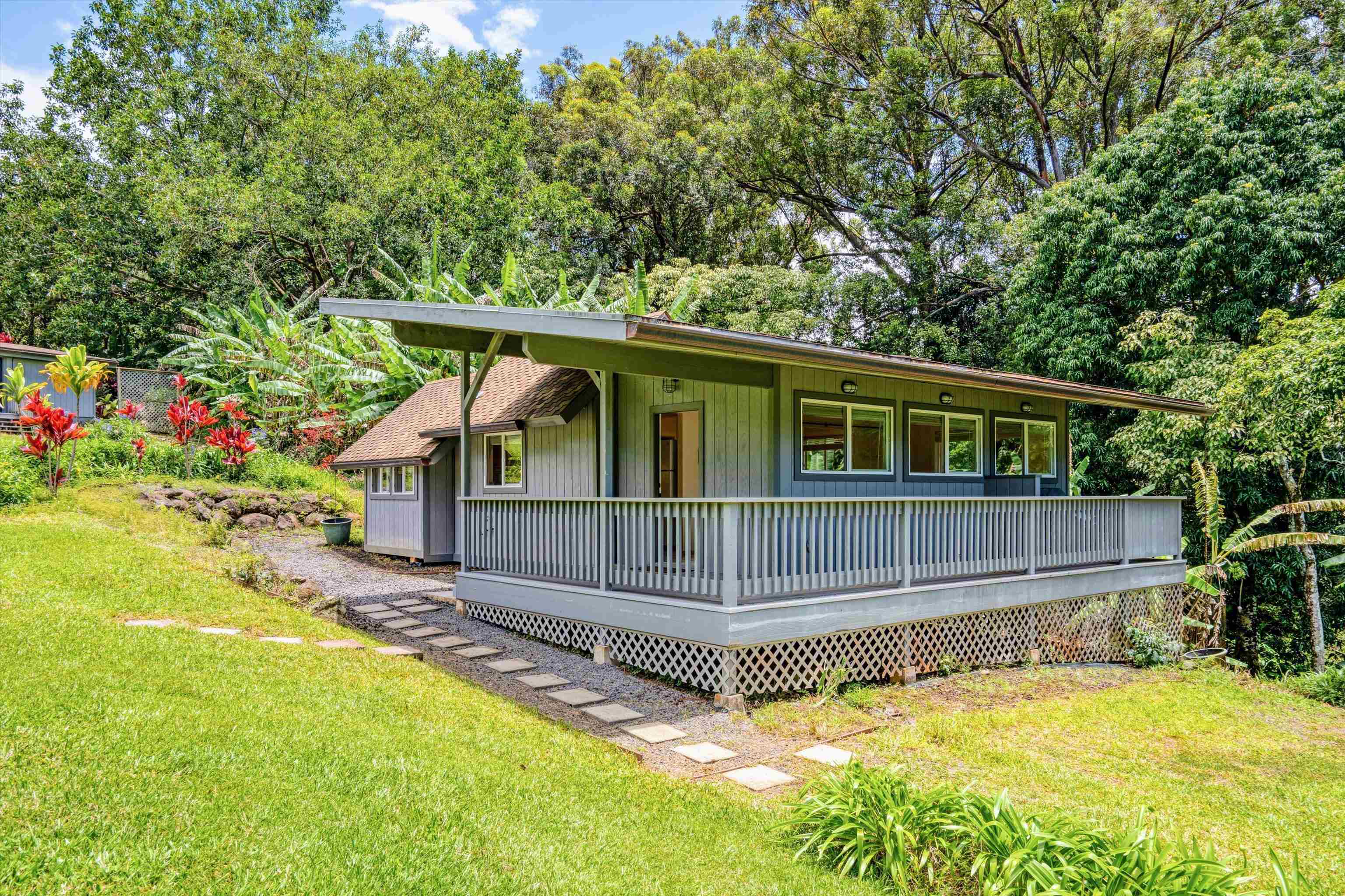 303 Waipalani Road Haiku, HI 96708 - Photo 35 of 46 a view of house with a yard balcony