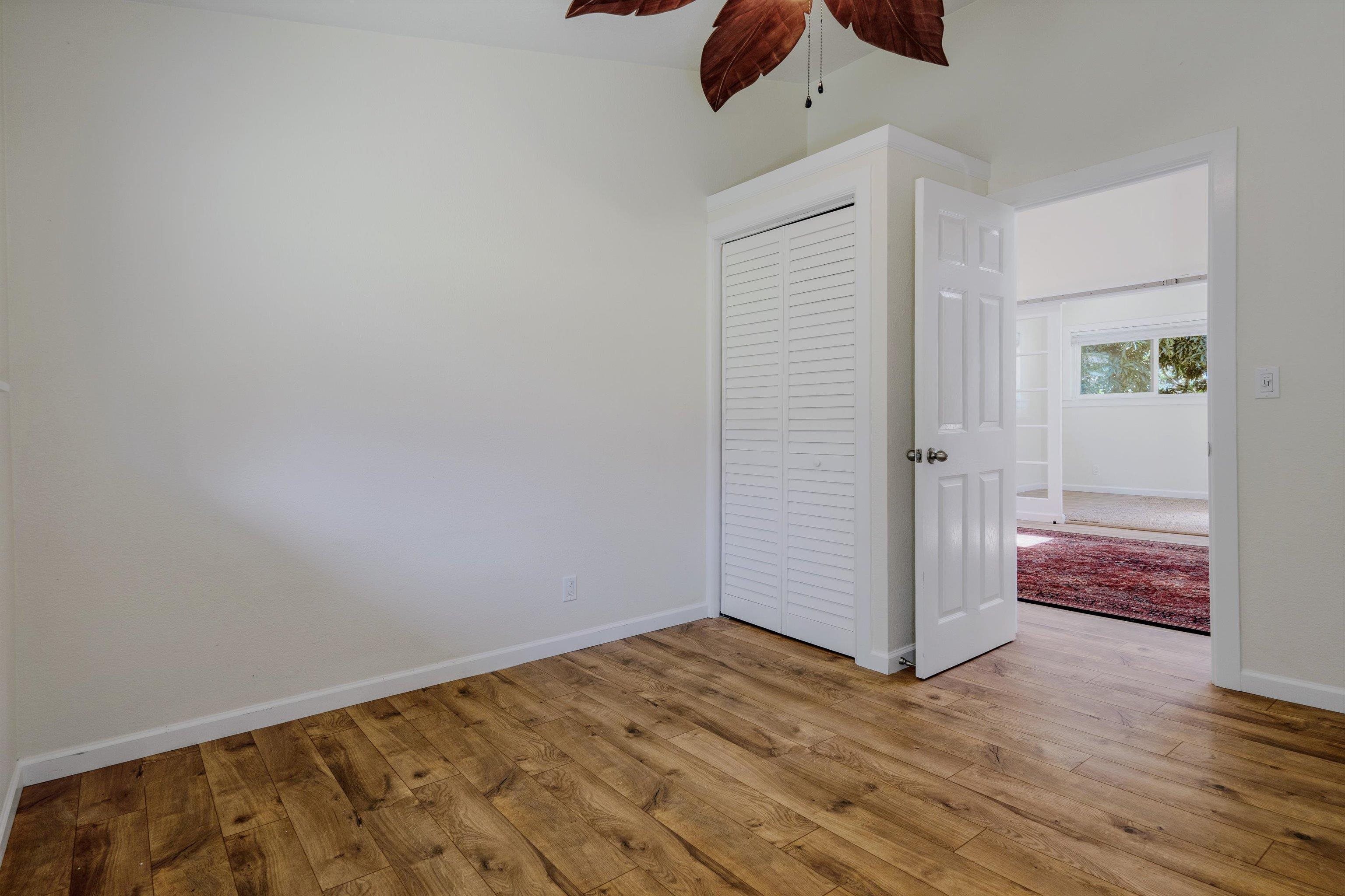 303 Waipalani Road Haiku, HI 96708 - Photo 38 of 46 wooden floor in an empty room
