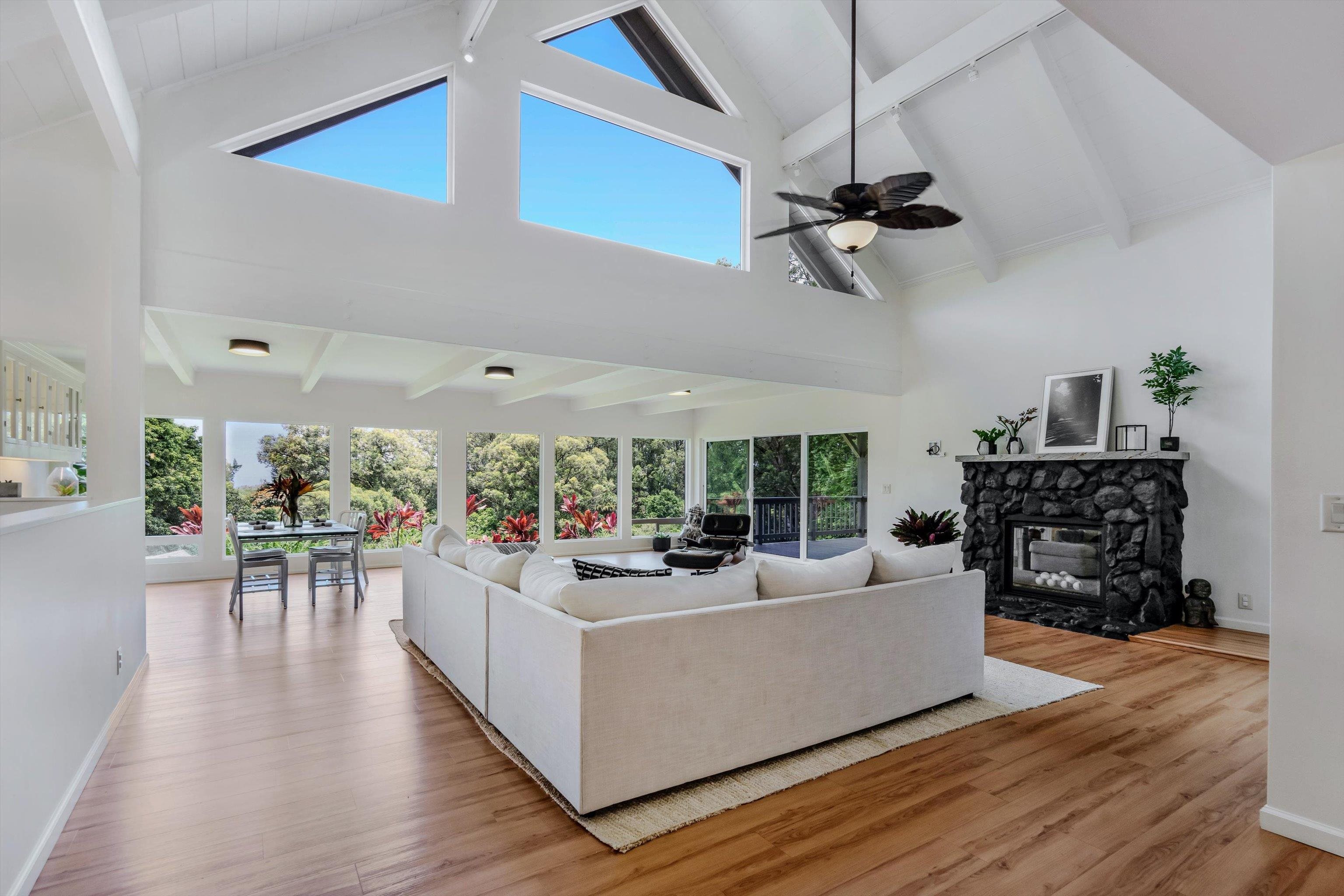 303 Waipalani Road Haiku, HI 96708 - Photo 7 of 46 a living room with furniture and wooden floor