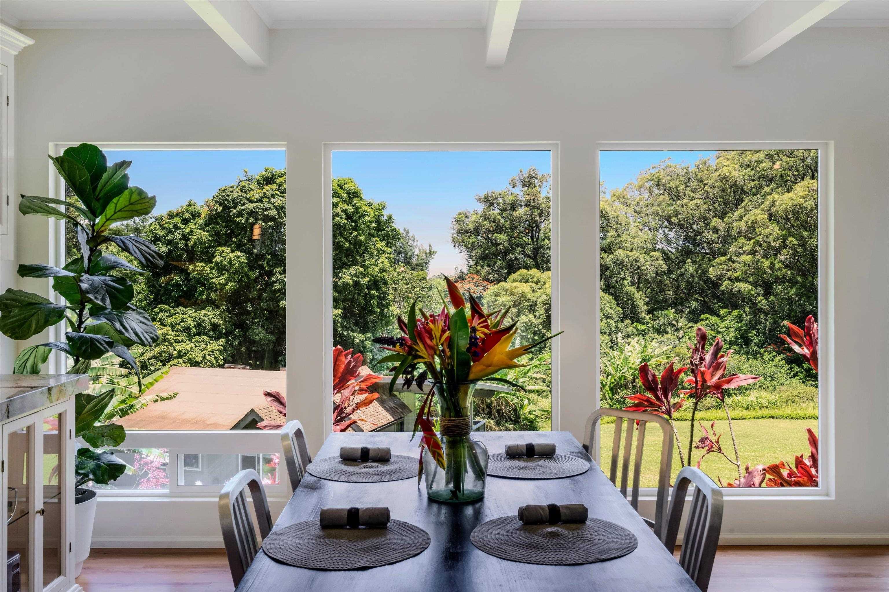 303 Waipalani Road Haiku, HI 96708 - Photo 9 of 46 a living room with furniture and a potted plant