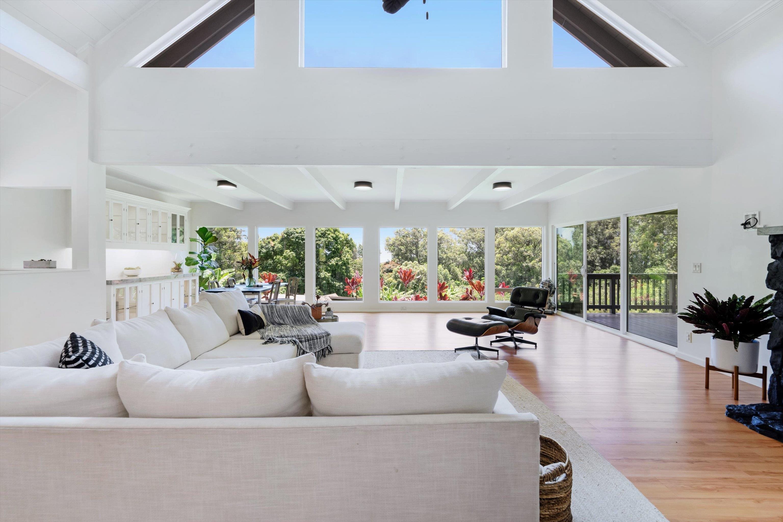 303 Waipalani Road Haiku, HI 96708 - Photo 10 of 46 a living room with furniture and a large window