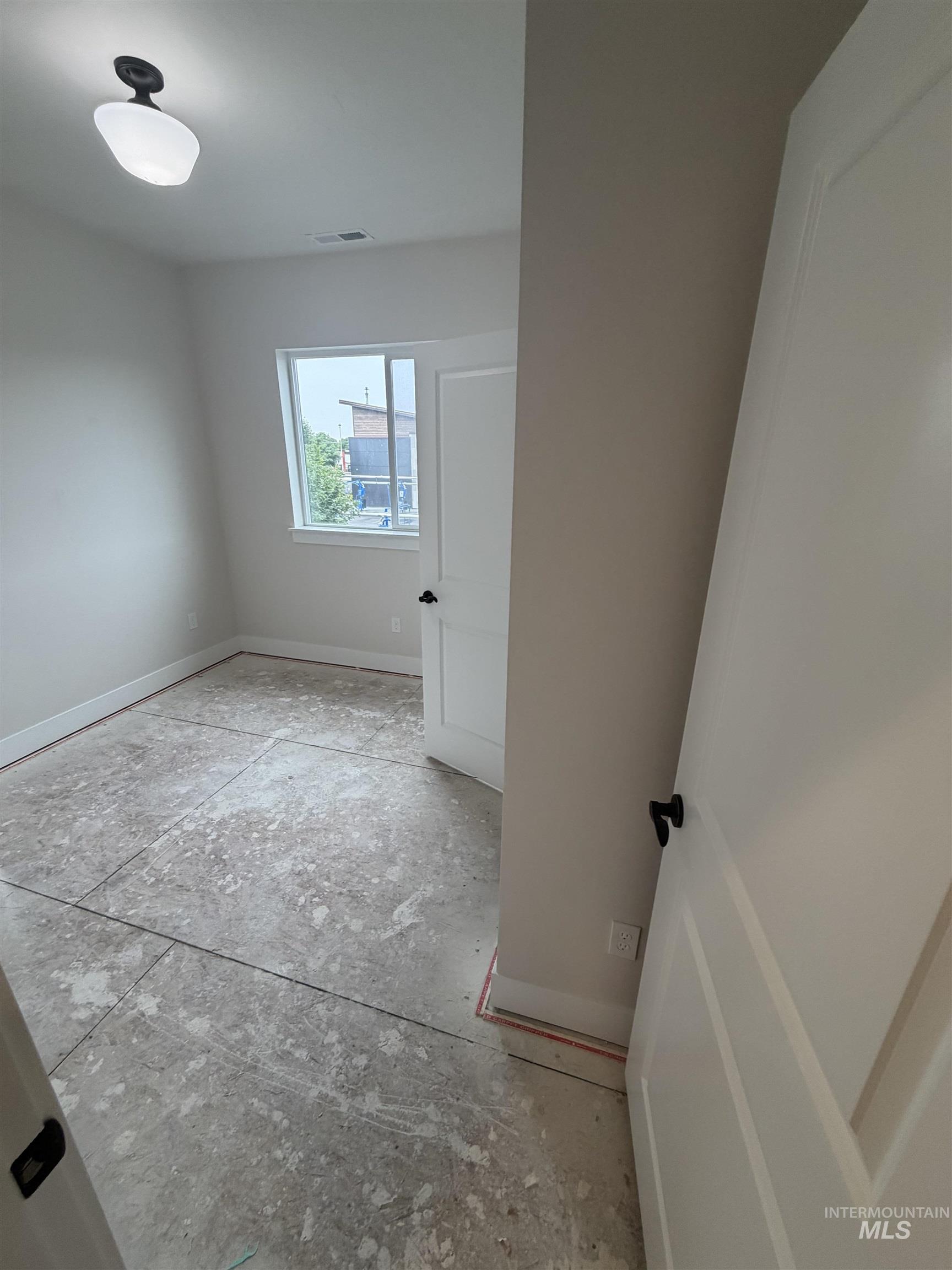 1475 North Bluffs Ridge Lane Boise, ID 83704 - Photo 3 of 13 Stairs going up and under stair storage closet