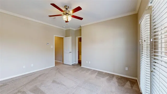 a view of an empty room and window