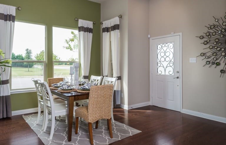 16017 Travesia Way Austin, TX 78728 - Photo 2 of 12 a view of a dining room with furniture window and wooden floor