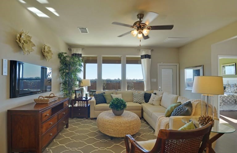 16017 Travesia Way Austin, TX 78728 - Photo 7 of 12 a living room with furniture and a large window