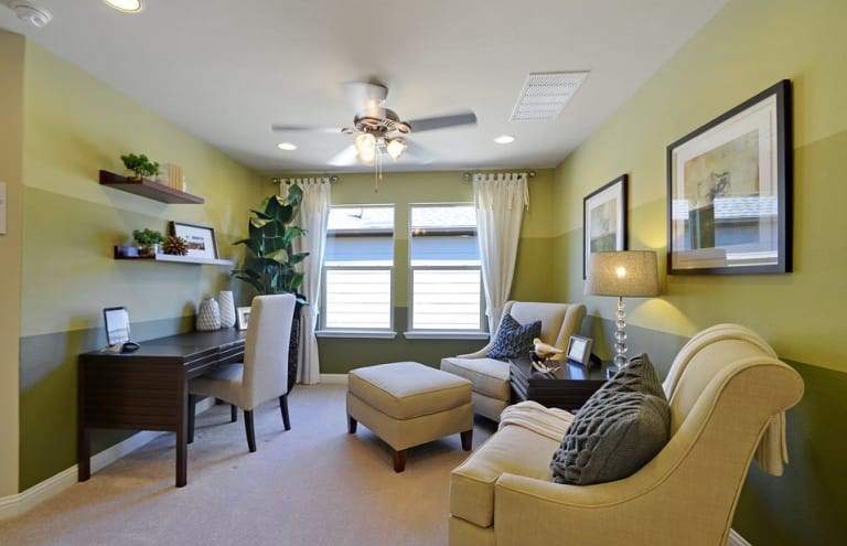 16017 Travesia Way Austin, TX 78728 - Photo 10 of 12 a living room with furniture and a large window