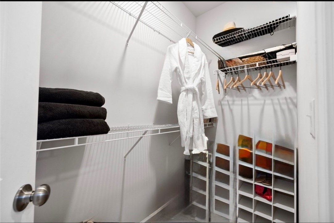 221 Scenic Drive Anderson, SC 29621 - Photo 12 of 27 This spacious walk-in closet offers ample storage and efficient organization for any wardrobe.