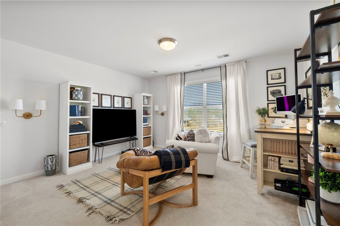 221 Scenic Drive Anderson, SC 29621 - Photo 17 of 27 This bright and inviting room offers a versatile space for both relaxation and productivity.