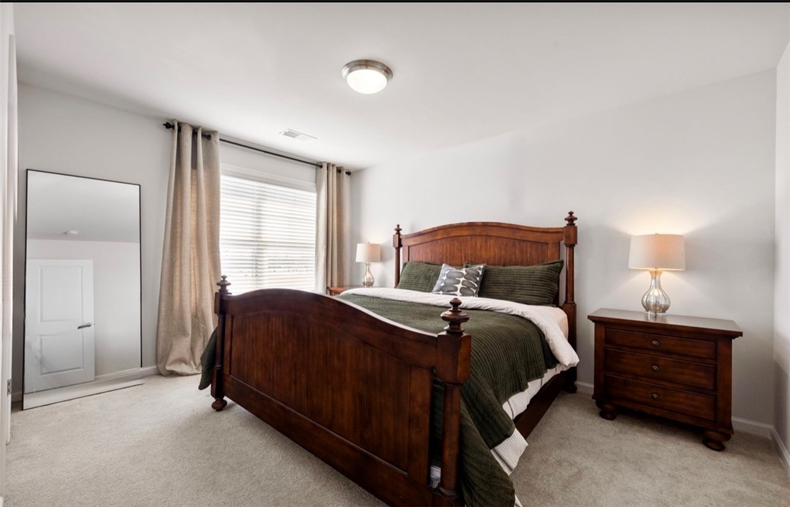 221 Scenic Drive Anderson, SC 29621 - Photo 18 of 27 This inviting bedroom provides a comfortable and tranquil retreat for rest and relaxation.