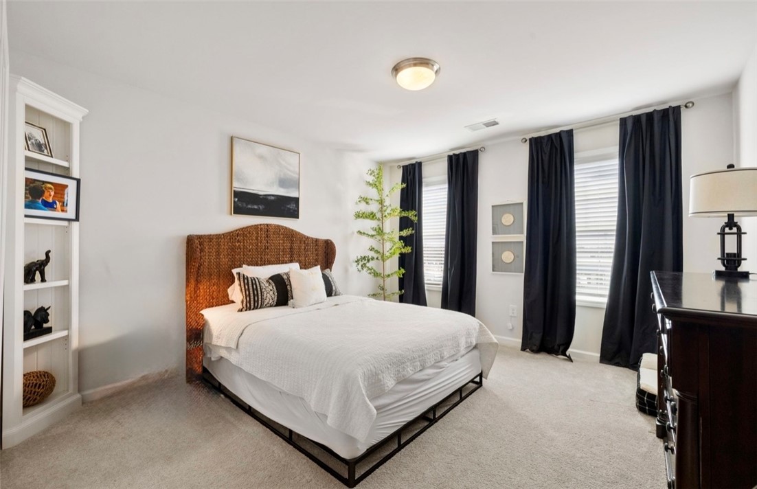 221 Scenic Drive Anderson, SC 29621 - Photo 21 of 27 This peaceful bedroom provides a comfortable retreat with ample natural light.