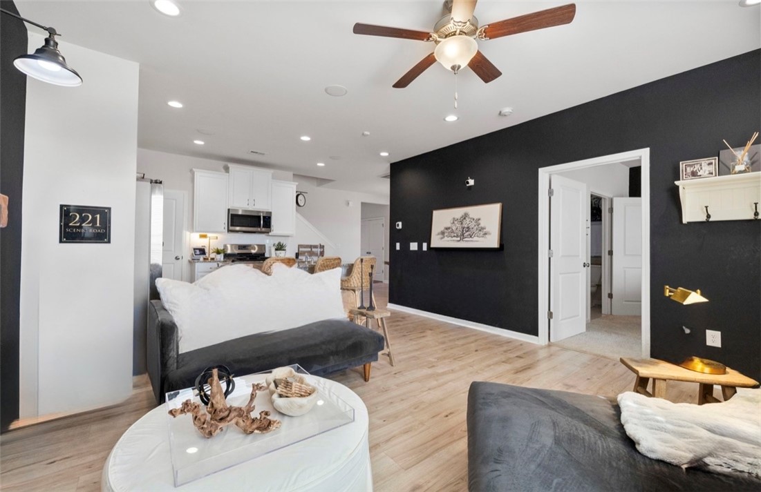 221 Scenic Drive Anderson, SC 29621 - Photo 4 of 27 This inviting space combines comfort and contemporary design with an open-concept flow.