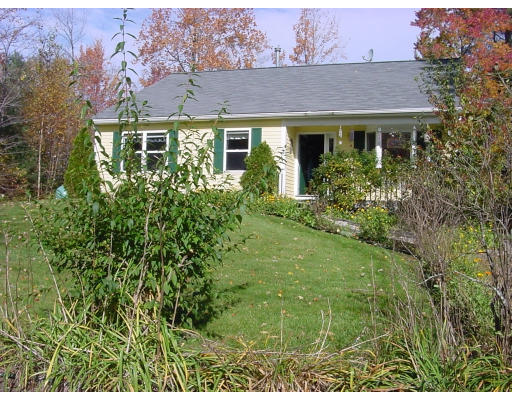 6 A Cross Street Rindge, NH 03461 - Photo 1 of 1 a view of a yard in front of house