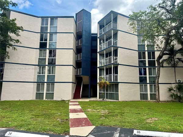 a view of building with yard