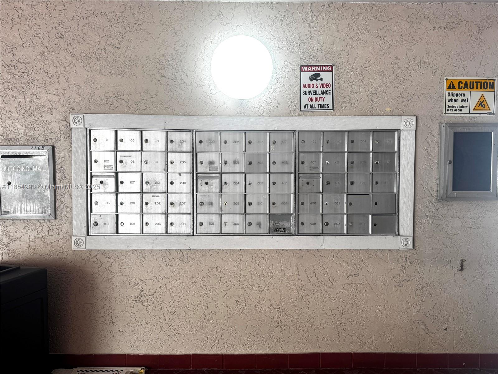 7165 Northwest 186th Street, Unit A211 Hialeah, FL 33015 - Photo 15 of 15 a view of an empty room with a window