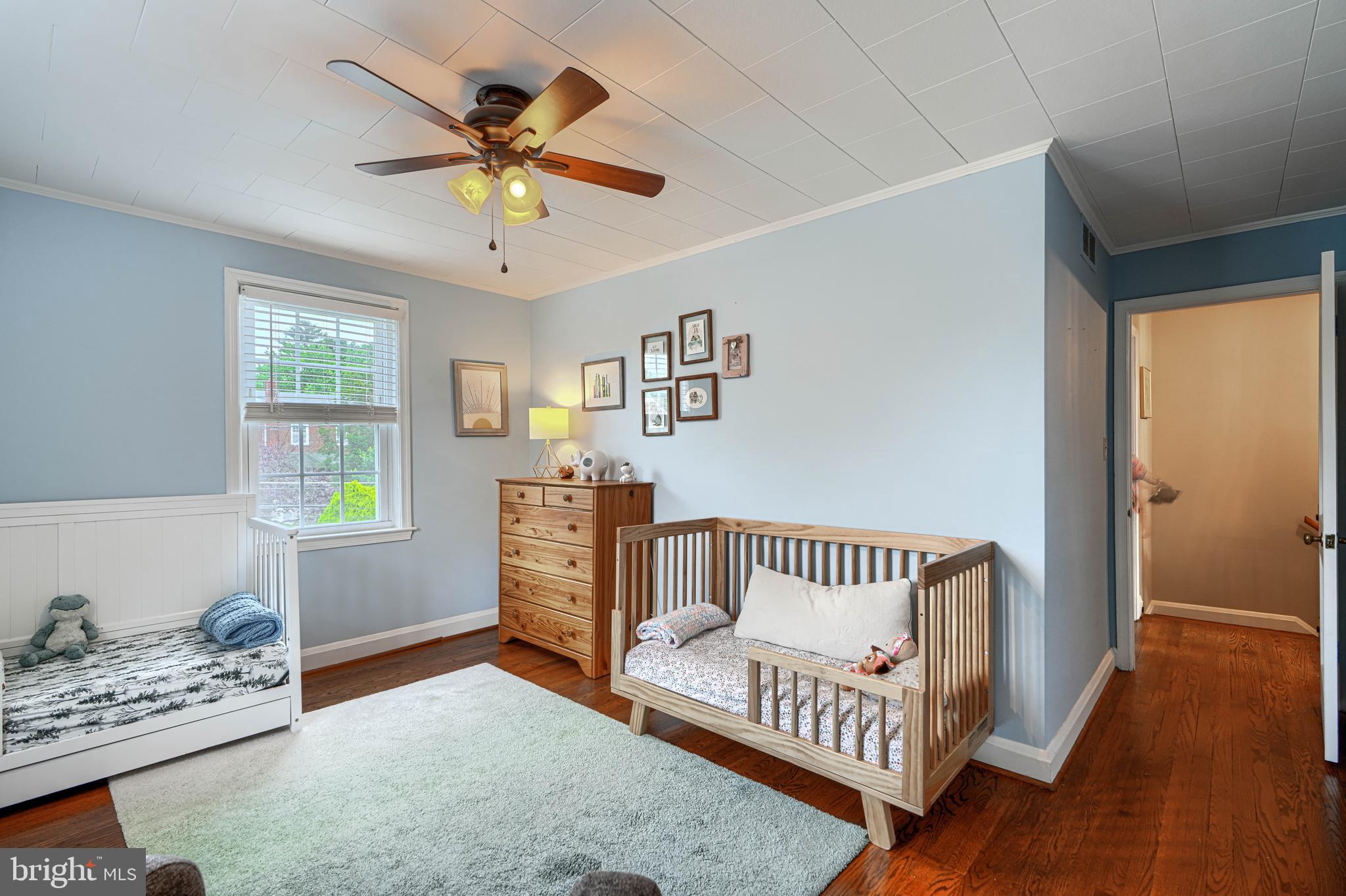 8132 Pleasant Plains Road Towson, MD 21286 - Photo 27 of 55 a bedroom with furniture and a window