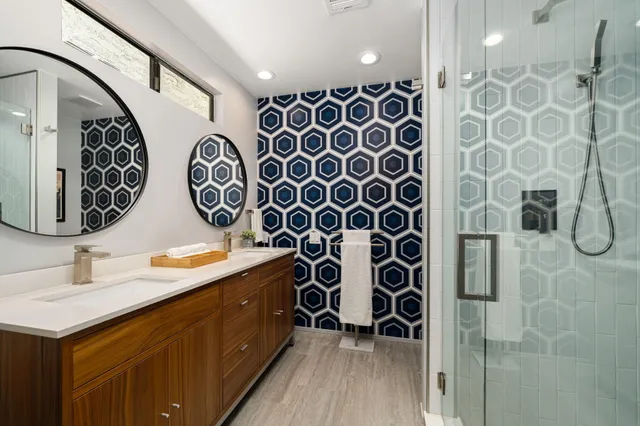 a bathroom with a sink and mirror