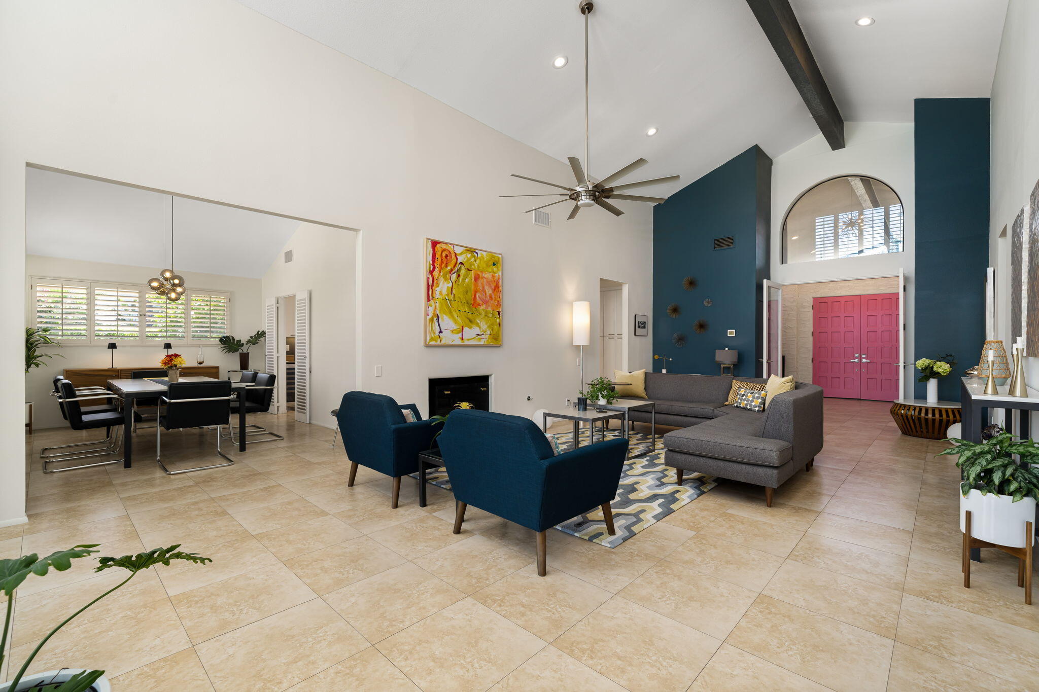 41 Lincoln Place Rancho Mirage, CA 92270 - Photo 10 of 37 a living room with furniture chandelier and a window