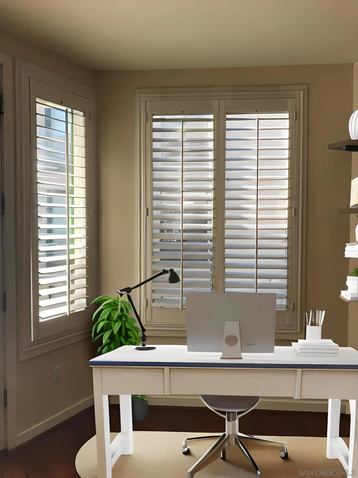 5440 La Jolla Boulevard, Unit E208 La Jolla, CA 92037 - Photo 11 of 35 a room with a table chairs and window