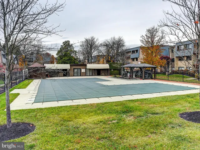 a view of a house with swimming pool