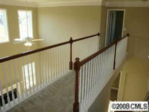 1006 Loudoun Road, Unit AD147 Indian Trail, NC 28079 - Photo 3 of 3 a view of staircase with railing and a window