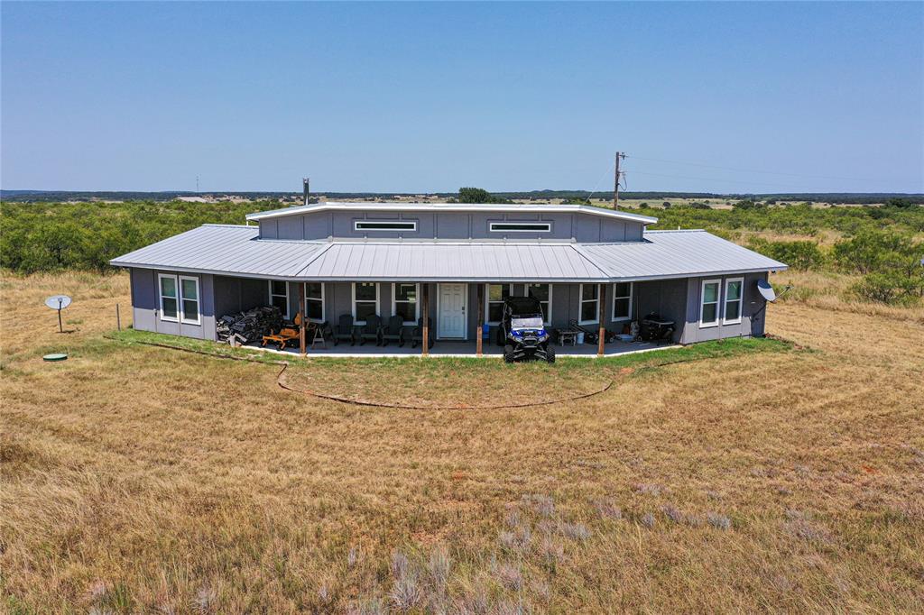 1259 Roney Road Jacksboro, TX 76458 - Photo 15 of 40 a front view of a house with a yard
