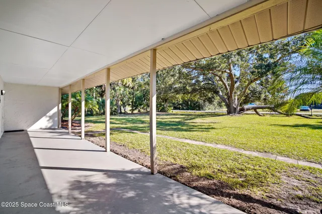a view of a house with a ocean view