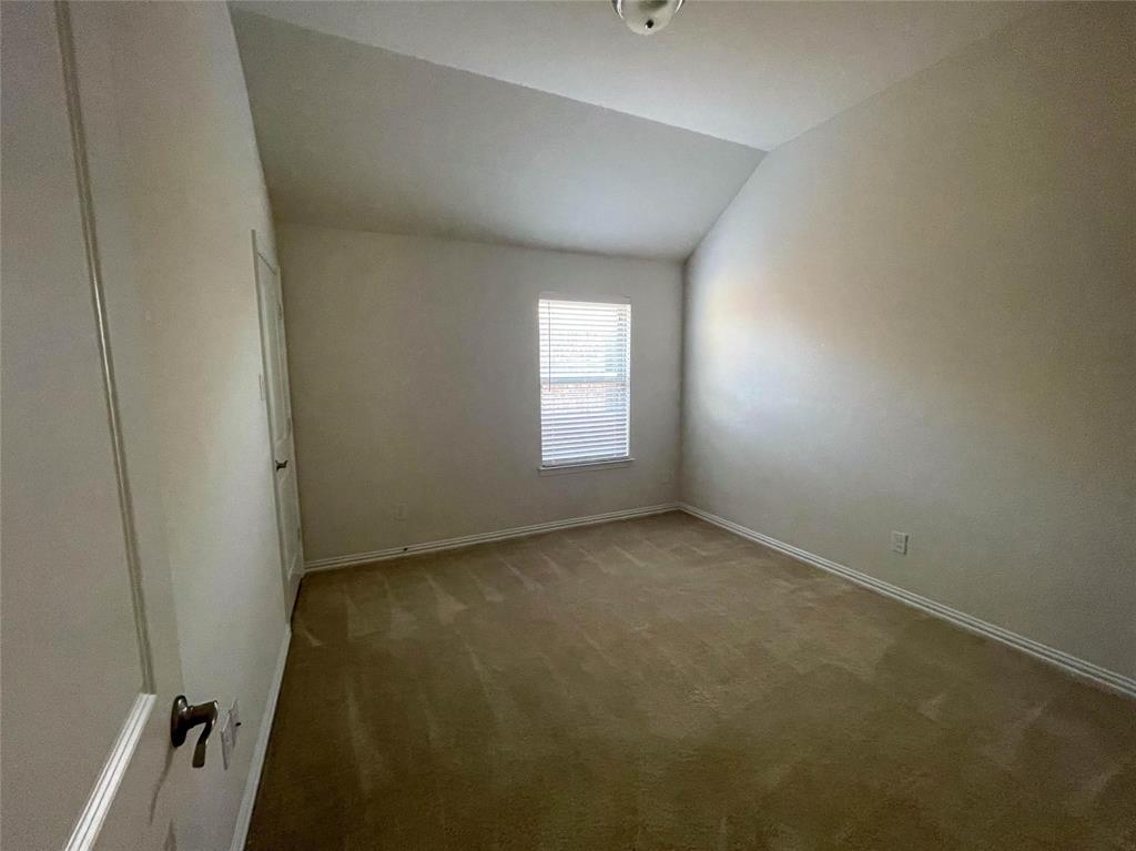 723 Callaway Drive Allen, TX 75013 - Photo 21 of 25 an empty room with a window