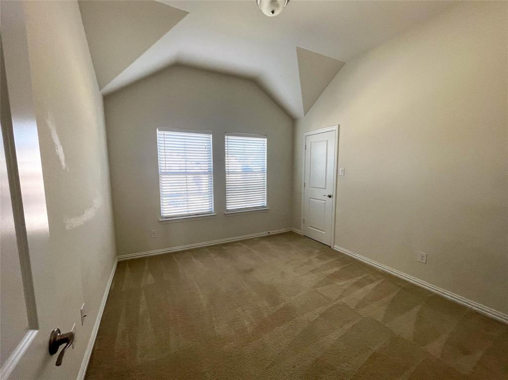 723 Callaway Drive Allen, TX 75013 - Photo 22 of 25 an empty room with windows