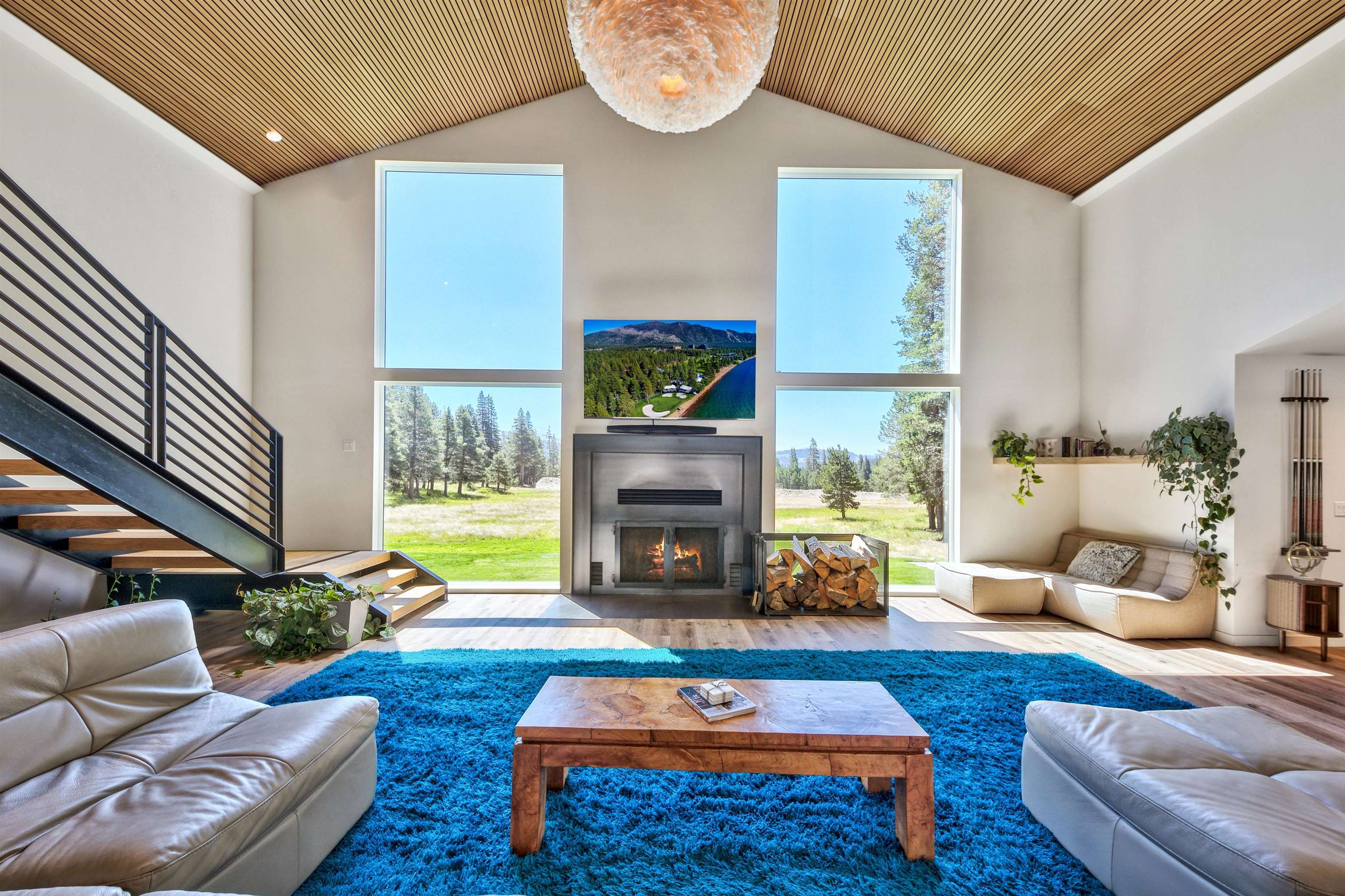 804 Fiberboard Road Sierraville, CA 96126 - Photo 4 of 28 a living room with furniture fireplace and a large window