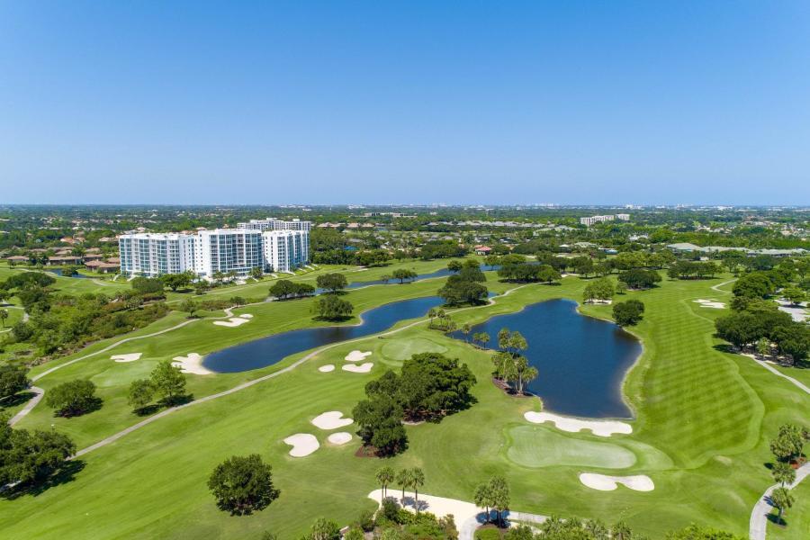 20155 Boca W Drive, Unit B701 Boca Raton, FL 33434 - Photo 53 of 78 a view of a lake with a city