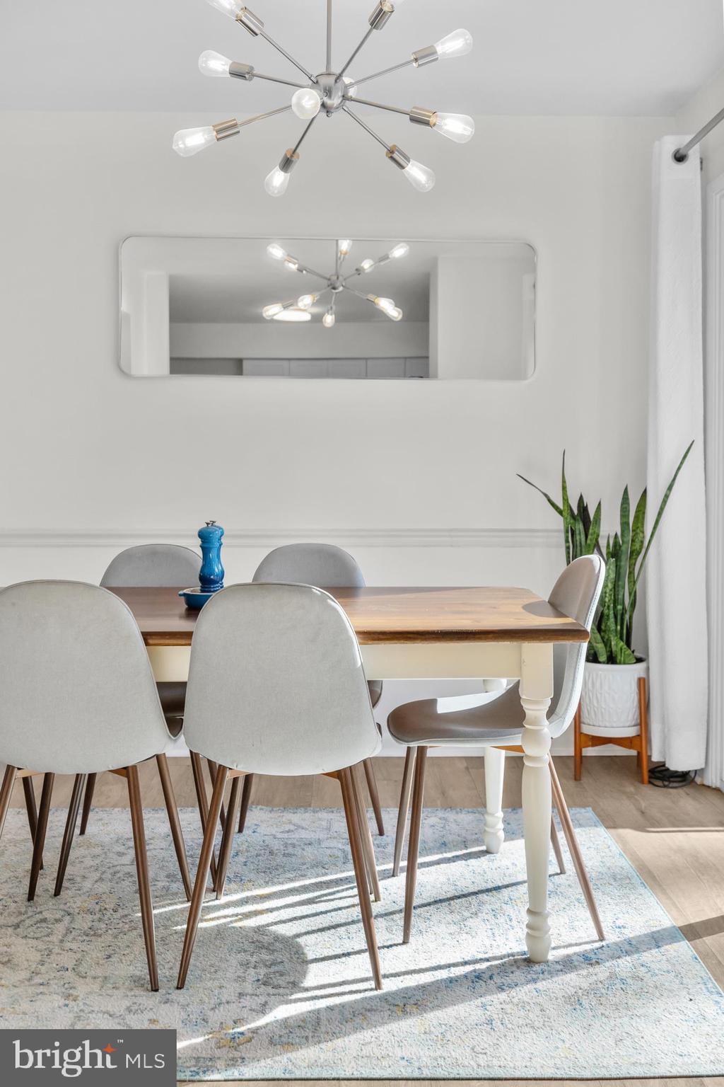 2320 Emerald Heights Court Reston, VA 20191 - Photo 12 of 44 a view of a dining room with furniture and wooden floor