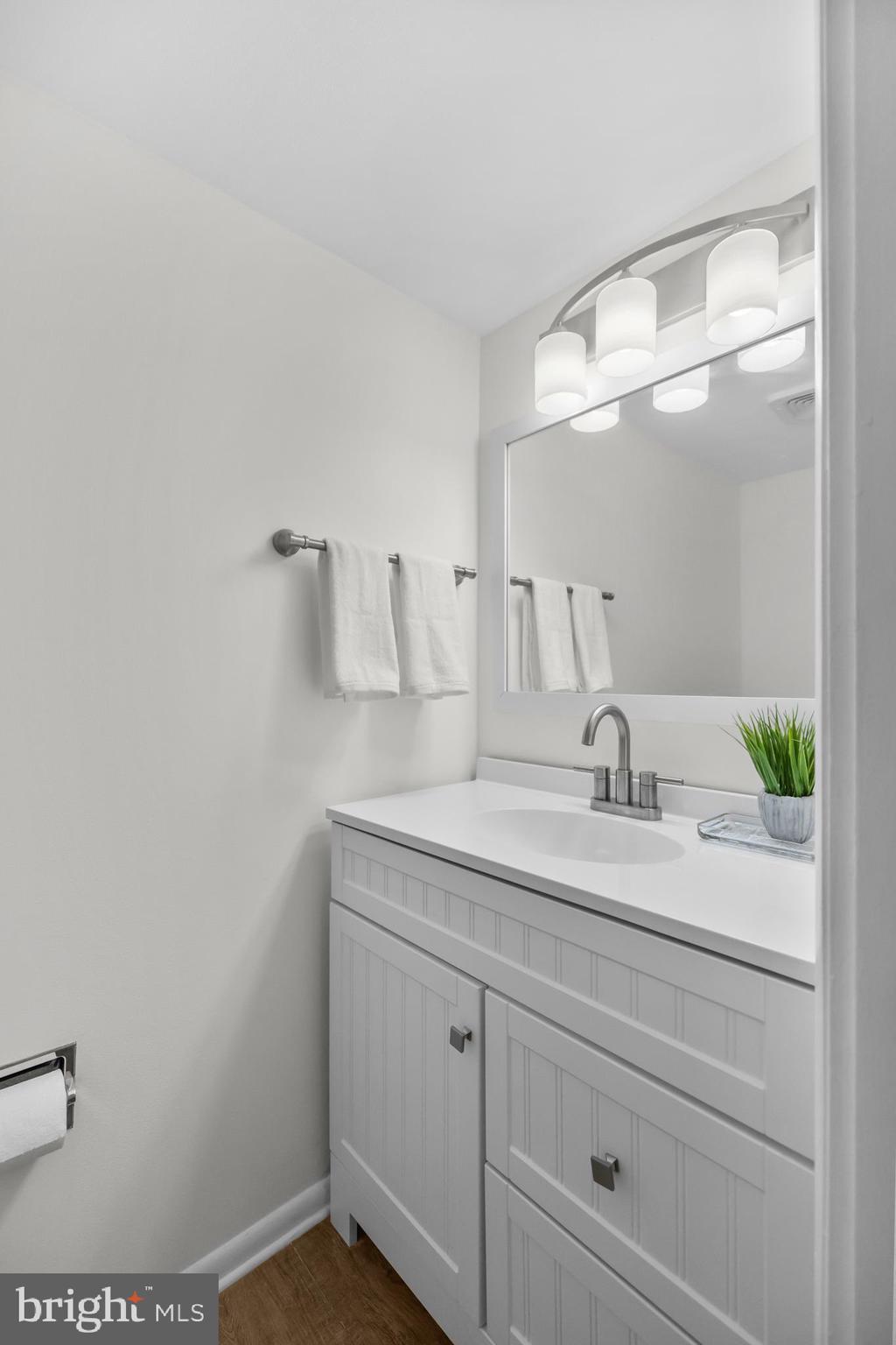 2320 Emerald Heights Court Reston, VA 20191 - Photo 21 of 44 a bathroom with a sink and a mirror