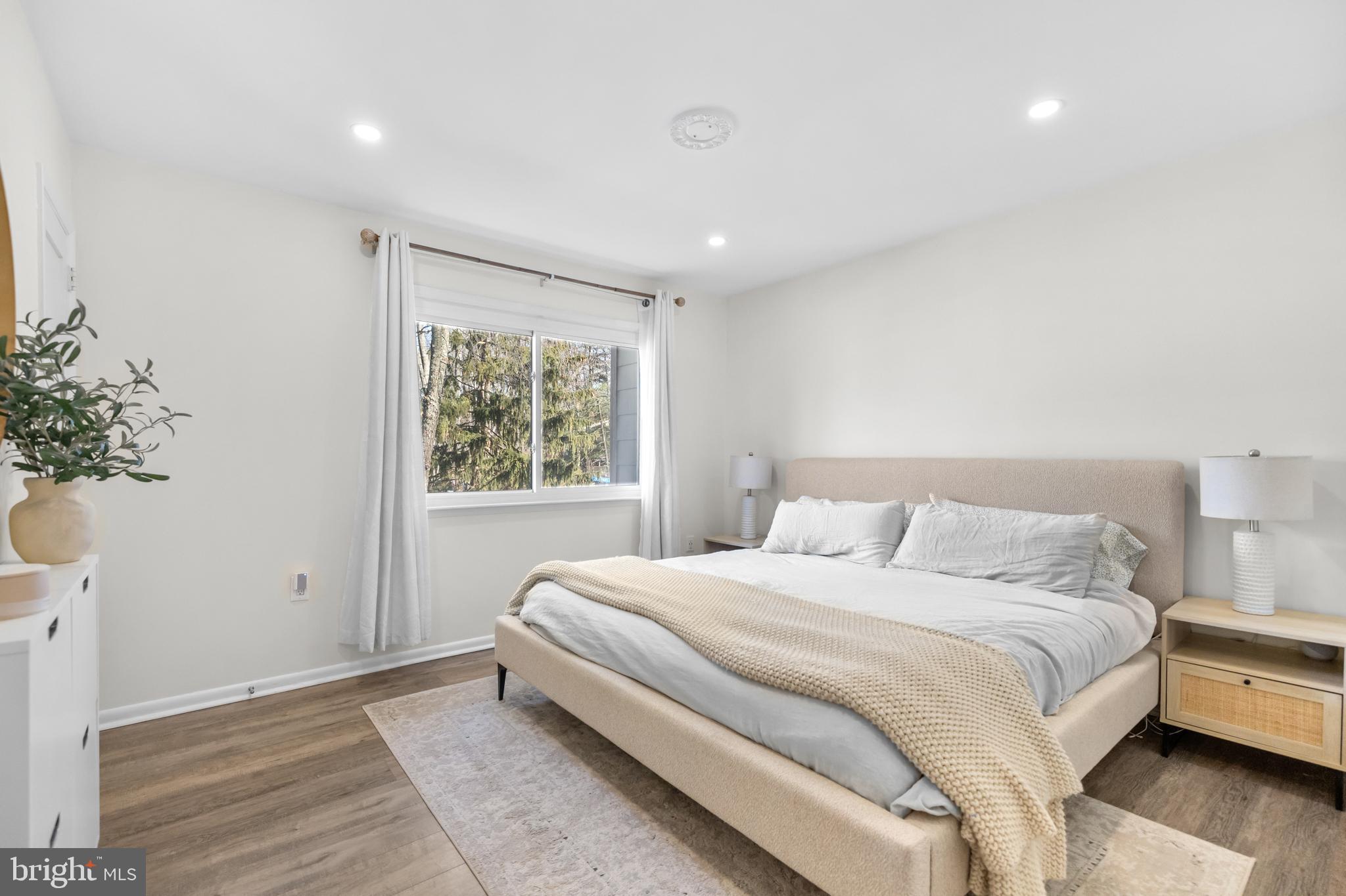 2320 Emerald Heights Court Reston, VA 20191 - Photo 23 of 44 a bedroom with a large bed and a window