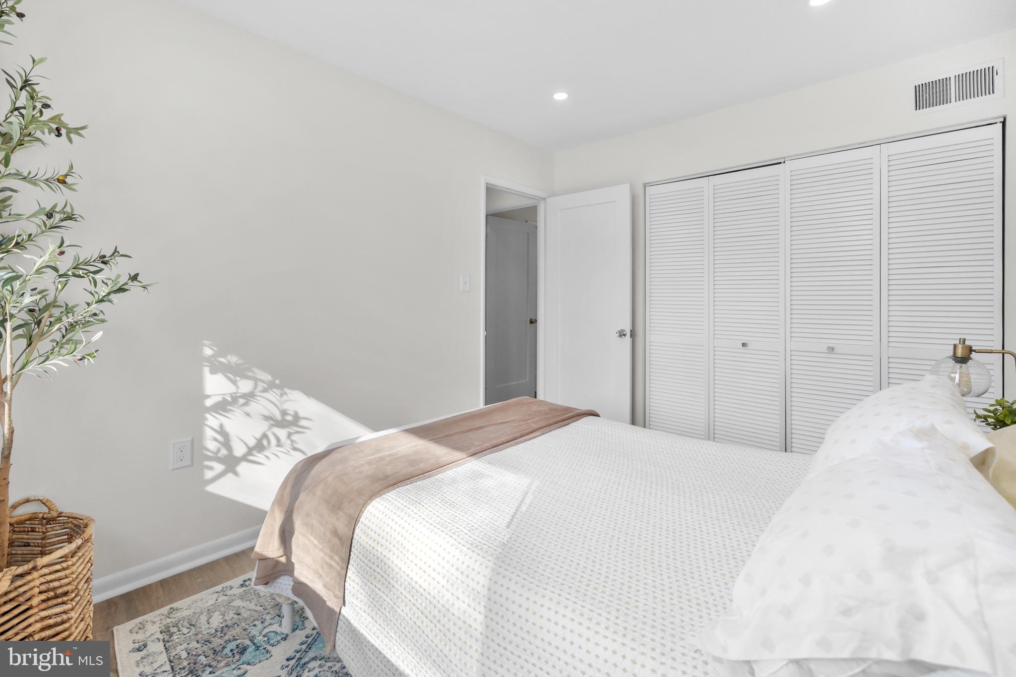 2320 Emerald Heights Court Reston, VA 20191 - Photo 24 of 44 a bedroom with a bed and a window