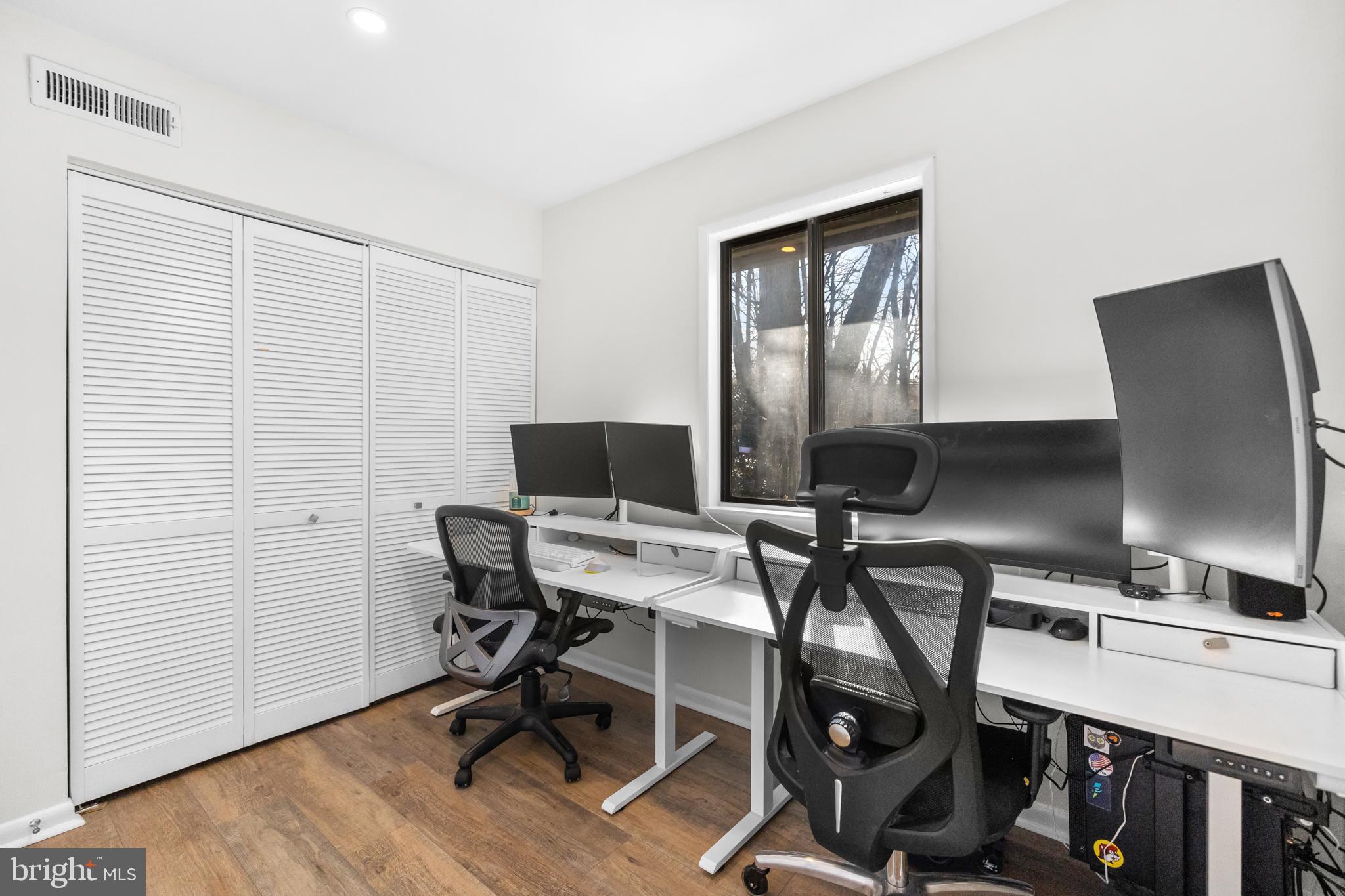 2320 Emerald Heights Court Reston, VA 20191 - Photo 30 of 44 a view of a workspace with furniture and a window