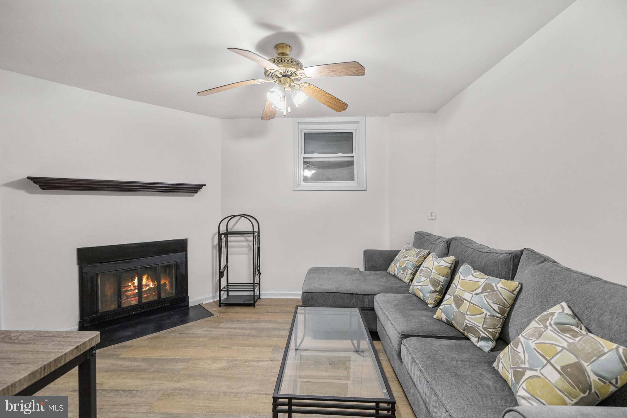 2320 Emerald Heights Court Reston, VA 20191 - Photo 35 of 44 a living room with furniture and a fireplace