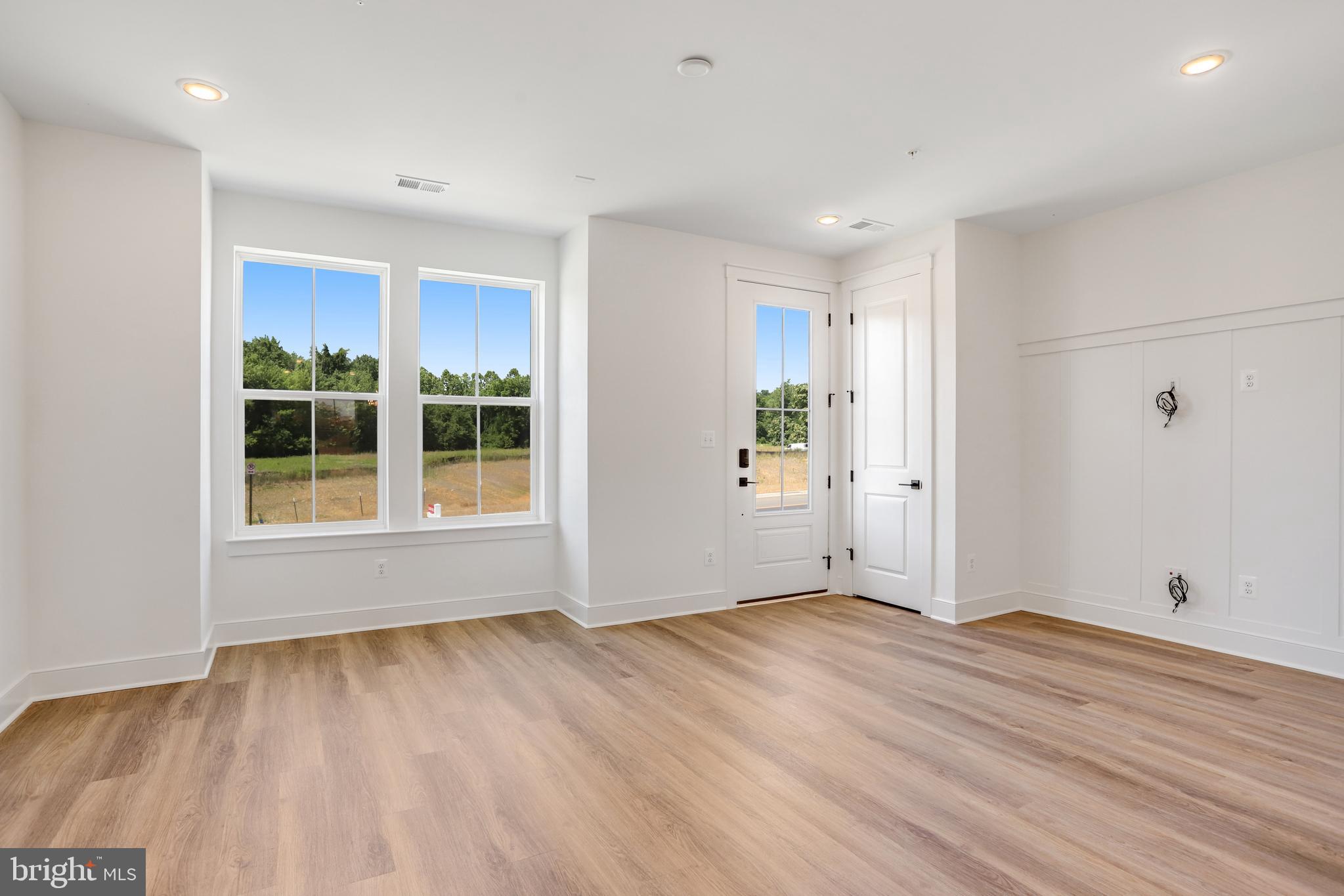 757 Elevation Road Frederick, MD 21702 - Photo 4 of 35 a view of wooden floor and windows in a room