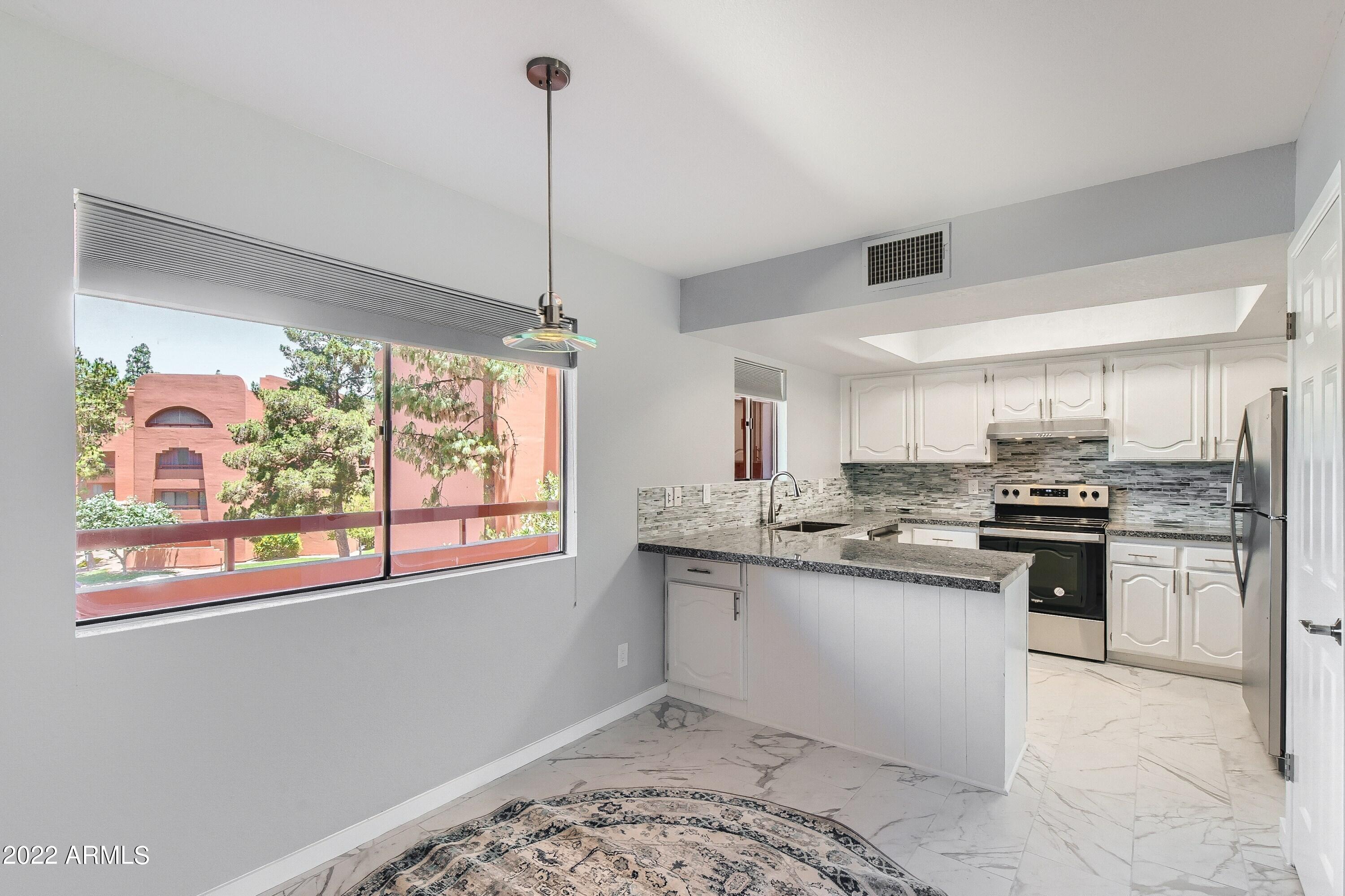 4303 East Cactus Road, Unit 326 Phoenix, AZ 85032 - Photo 2 of 17 10 Breakfast Area