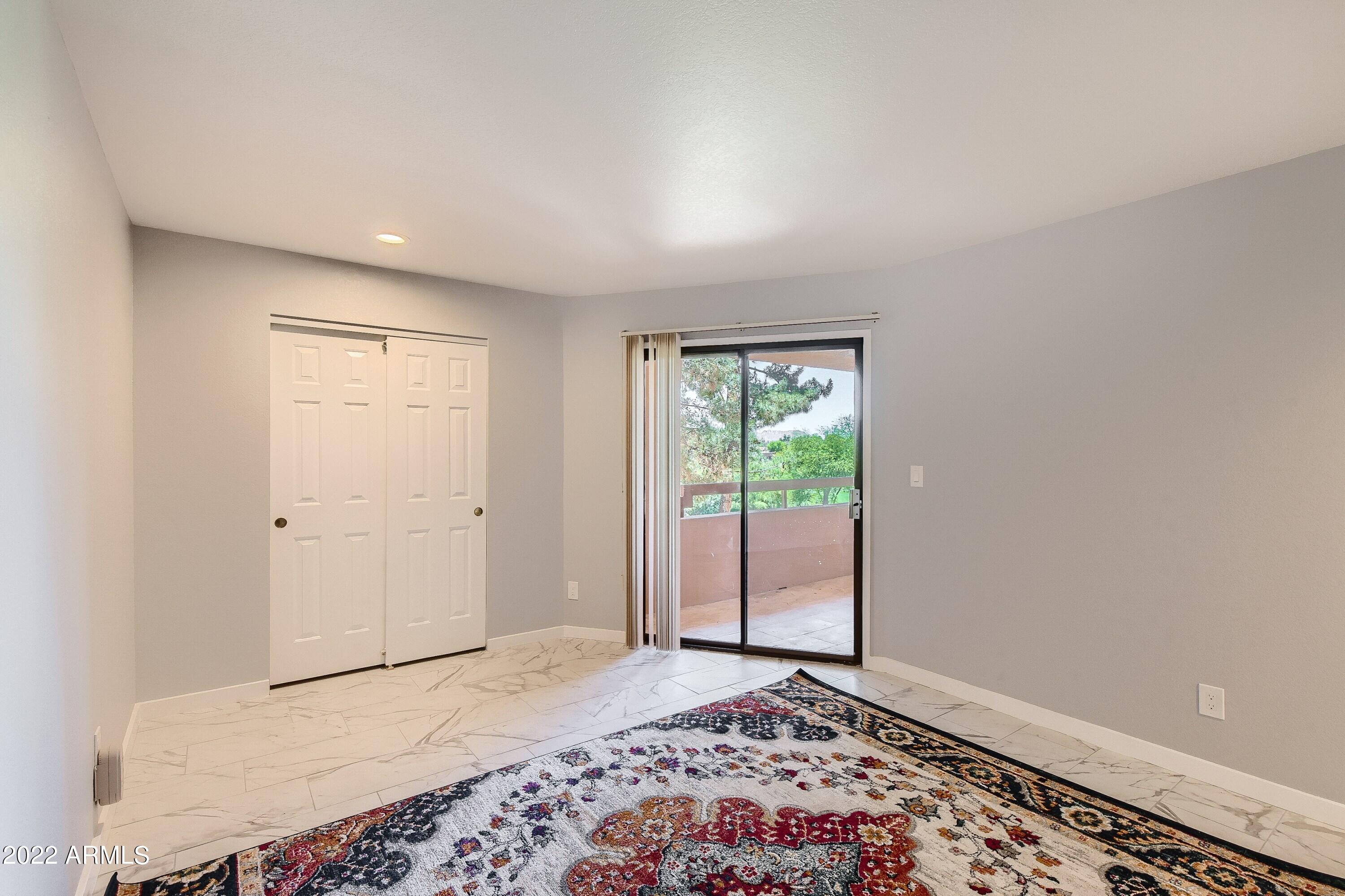4303 East Cactus Road, Unit 326 Phoenix, AZ 85032 - Photo 6 of 17 13 Primary Bedroom