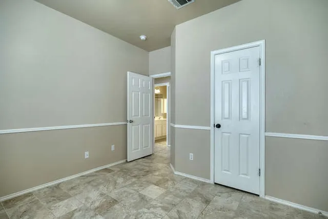 a bathroom with a shower sink vanity mirror and toilet
