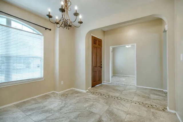 a view of a chandelier in a room