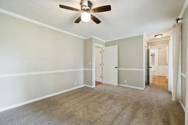 a view of a hallway with closet area